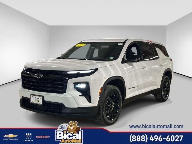2024 Chevrolet Traverse LS in Summit White — front three-quarter view