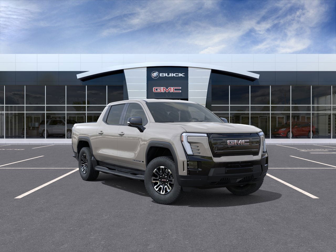2026 GMC Sierra EV Elevation Extended Range in Coastal Dune — front three-quarter view