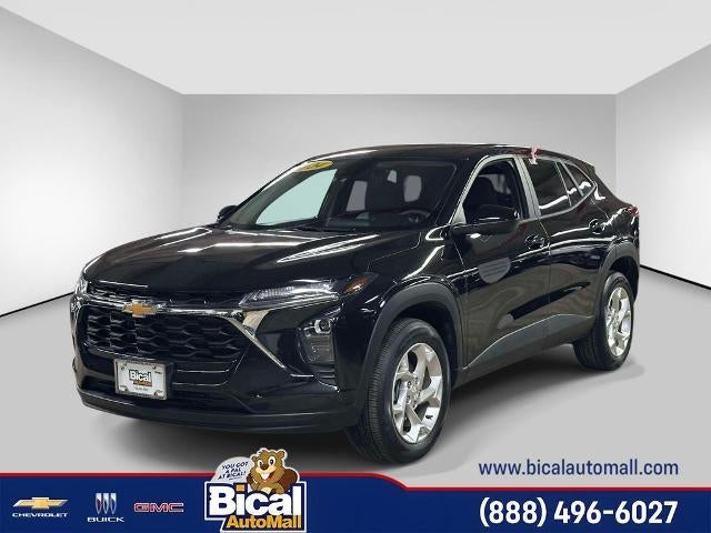2024 Chevrolet Trax LS in Mosaic Black Metallic — front three-quarter view